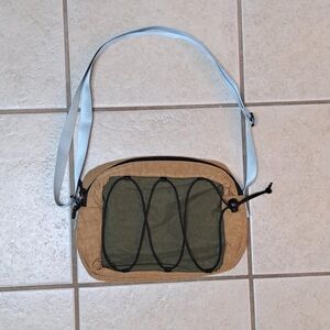 Urban Outfitters UO Ripstop Utility Sling Bag in a tan/brown and olive green